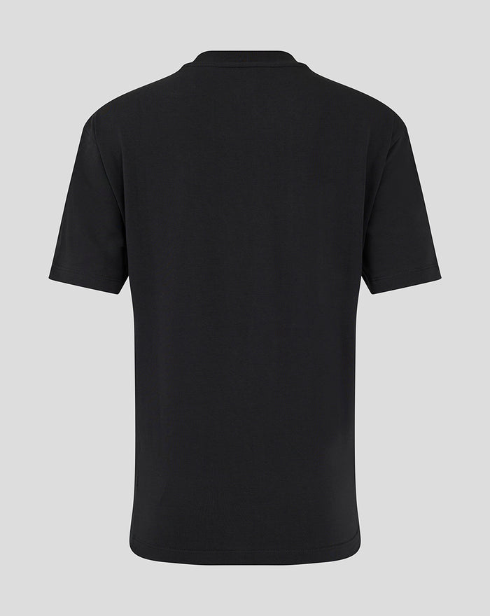 Achterkant van een zwarte FC Twente Travel T-shirt voor vrouwen met oversized pasvorm