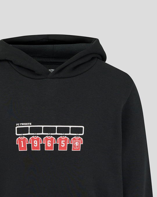 Close up of chest print on black FC Twente hoodie showing white rack and red numbered jerseys