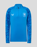 Front view of blue FC Twente midlayer top with crest on the left chest, Castore logo and camo patterned sleeves