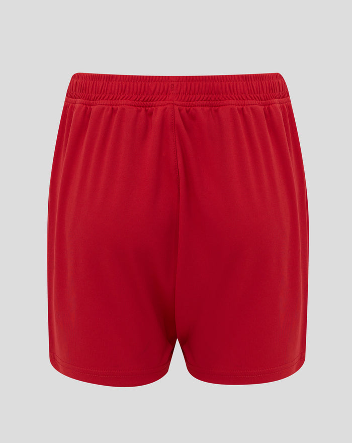 Waistband close-up of red FC Twente junior shorts showing elastic stitching