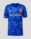 Blue FC Twente junior shirt with dot pattern and chest crest