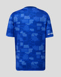 Back view of blue FC Twente junior shirt with dotted pattern