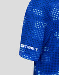 Lower chest and sleeve of FC Twente jersey with dotted pattern and Taurus sponsor visible