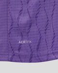 Purple fabric close-up showing AerTek branding on the garment.