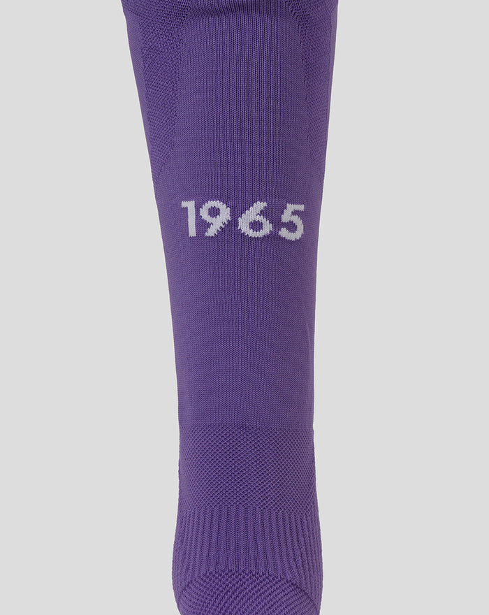 Purple FC Twente junior keeper sock with 1965 on the shin and textured knit.