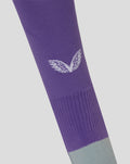 Purple FC Twente junior keeper sock close up with white Castore wing logo on calf.