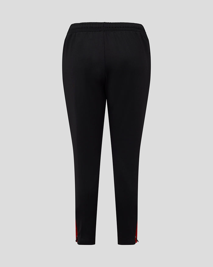 Back view of black junior FC Twente matchday pants with red side panels