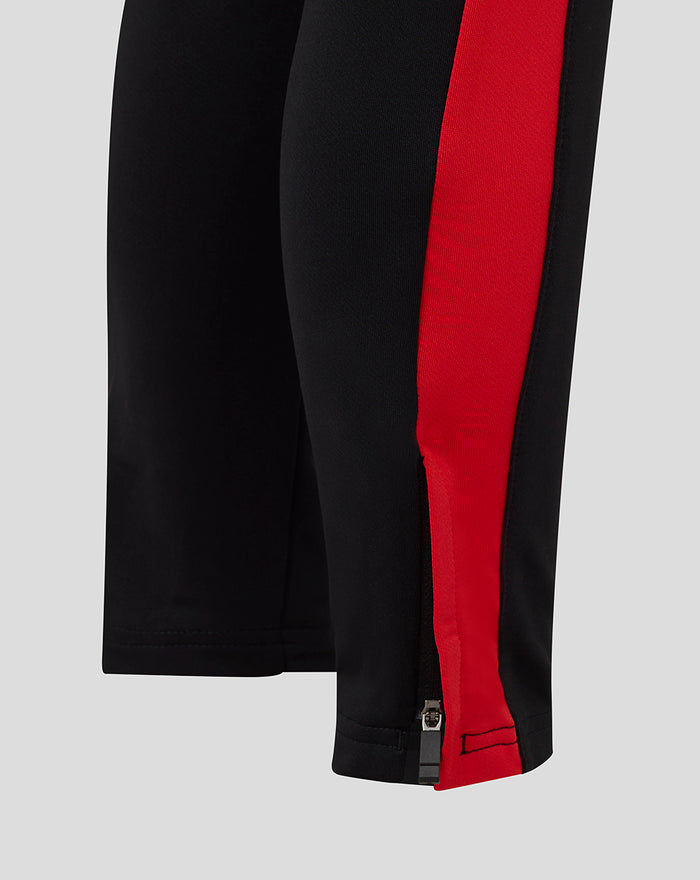 Zwarte FC Twente Matchday broek met rode zijband en een rits bij de enkel
