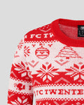 Red and white FC Twente Christmas sweater featuring snowflake motifs and a crest