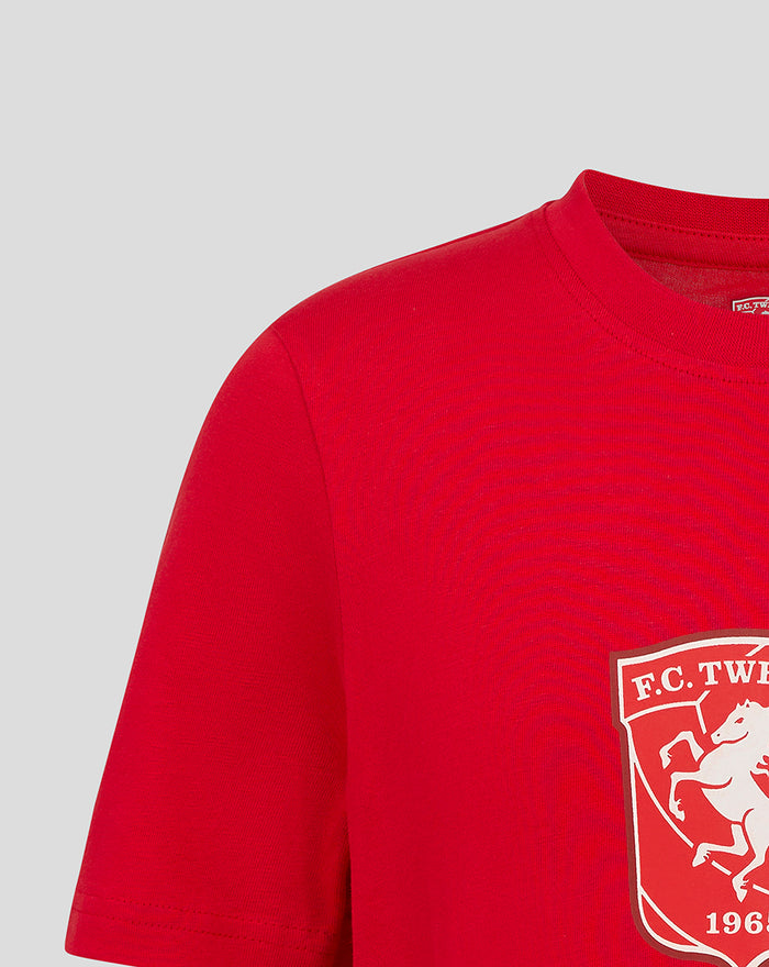 Close up of red FC Twente junior T shirt shoulder with partial crest