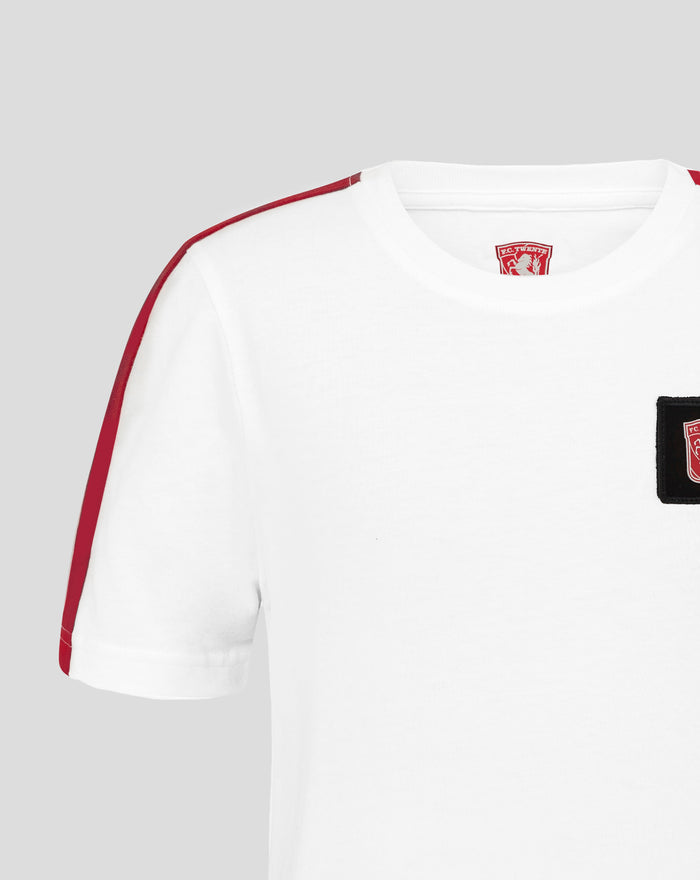 White FC Twente junior classic cotton T-shirt with red shoulder stripe and crest patch near the neckline.