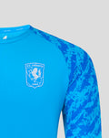 Shoulder and collar area of FC Twente blue performance jersey with camouflage sleeves and Castore branding