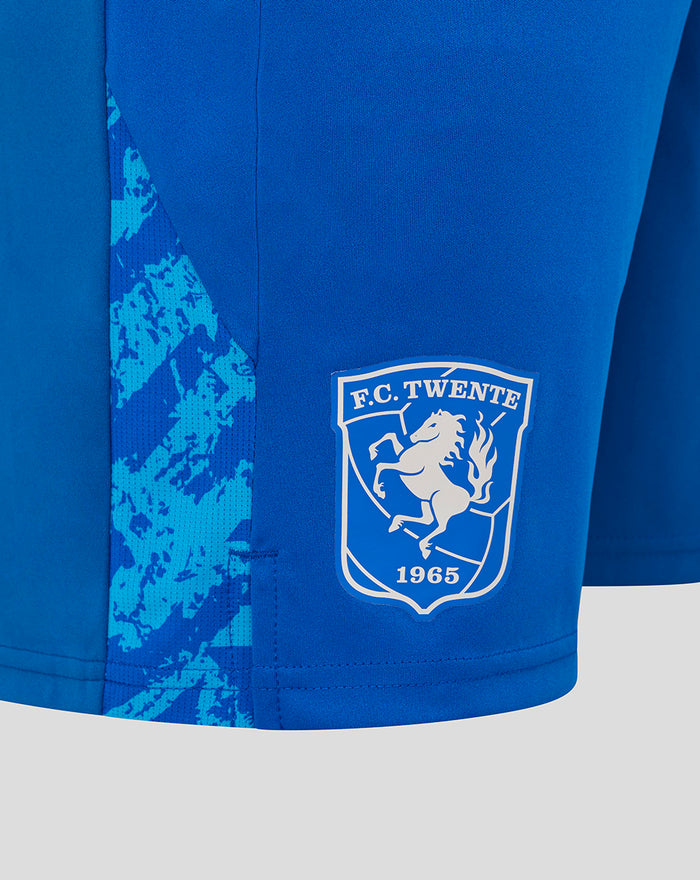 Close up of marine blue FC Twente shorts with white crest on the leg