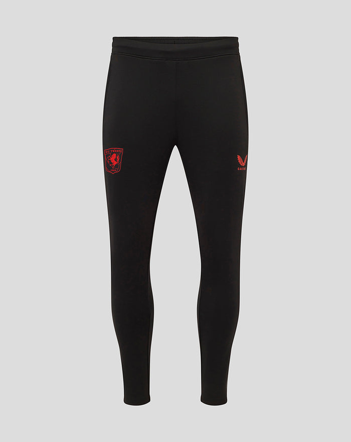 Front view of black FC Twente men's performance pants with a red club crest on the left thigh.