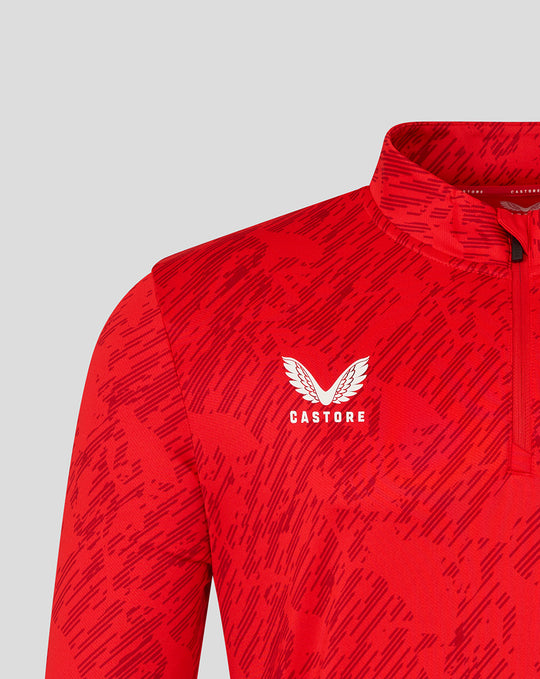 Red FC Twente Matchday Midlayer Top close-up with a white Castore logo and abstract red print including a quarter zipper