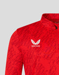 Red FC Twente Matchday Midlayer Top close-up with a white Castore logo and abstract red print including a quarter zipper