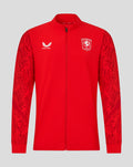 Red FC Twente Matchday Jack 25/26 men's jacket with full-length zipper, club crest on left chest and Castore logo on right chest, patterned sleeves