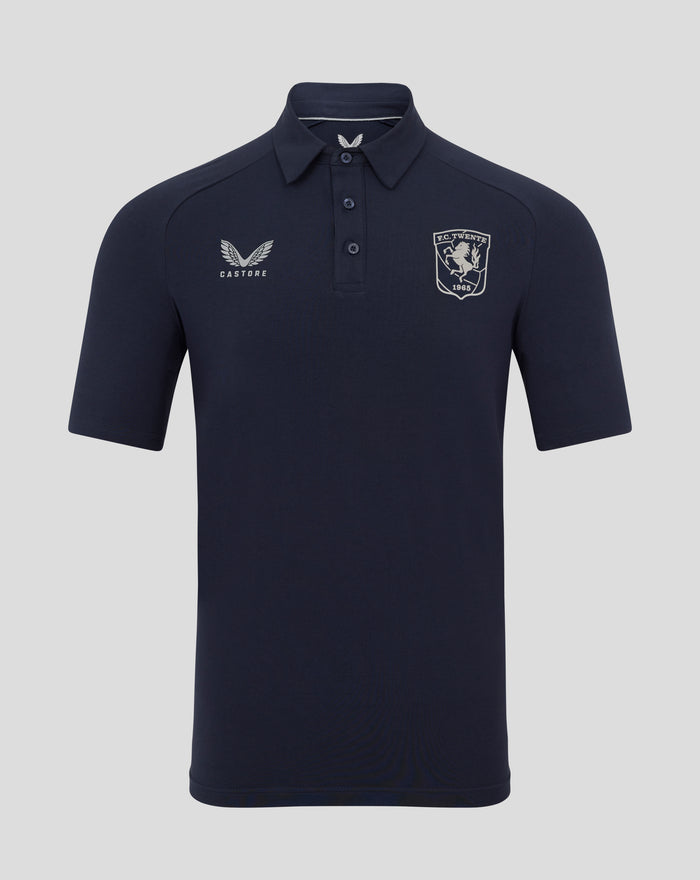 Navy FC Twente travel polo with crest on left chest and Castore logo on right