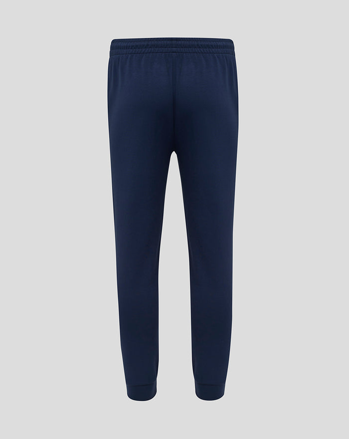 Back view of navy FC Twente Travel Knit pants with elastic cuffs at the ankles