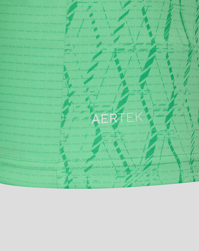 Closeup of bright green FC Twente keeper shirt fabric with AERTEK branding