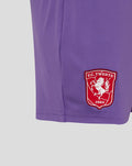 Close-up view of purple FC Twente keeper short showing crest on the lower leg.