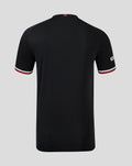 Back view of black FC Twente third shirt with a small red crest at the collar and tricolor cuff stripes
