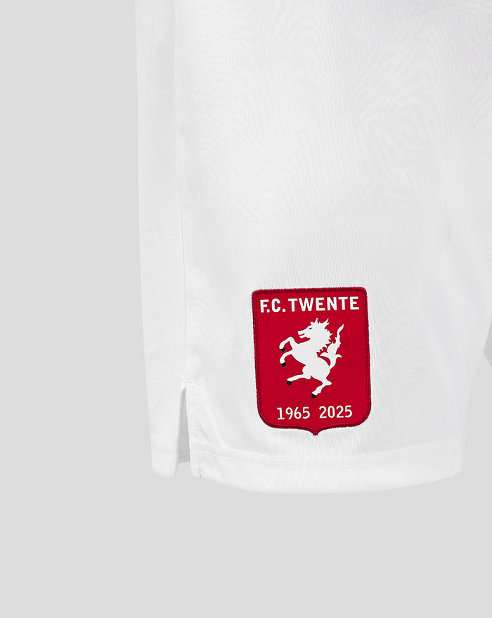 Close-up of white FC Twente Derde Short showing red crest patch on left leg.