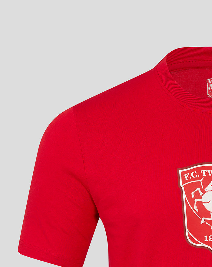 Close-up of red FC Twente T-shirt showing partial crest on the chest