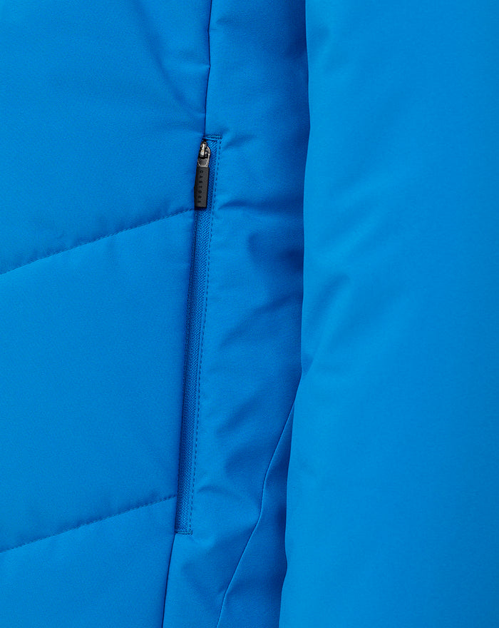 Close-up of the blue FC Twente jacket showing a vertical zipper along the side panel.
