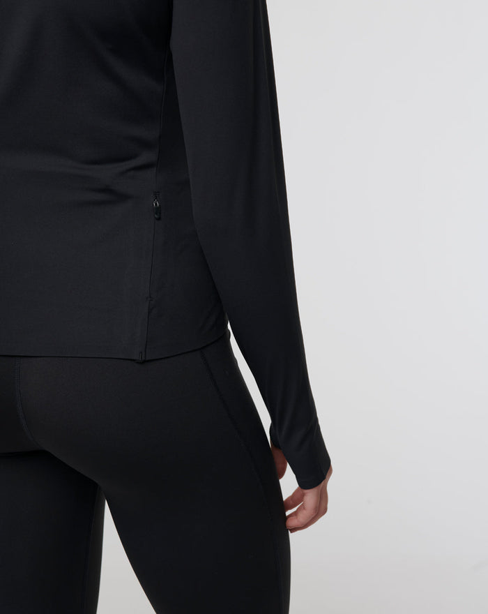 Back view of black Active Technical 1/4 Zip showing a subtle side back zipper and clean seam lines