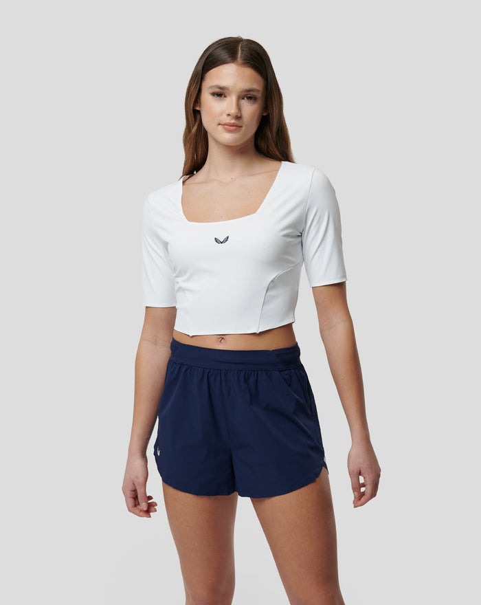 Front view of white Active Contour Crop Top featuring square neckline and short sleeves