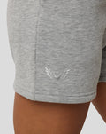 Close-up of grey Marl Apex shorts fabric with a silver embroidered wing logo