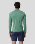Back view of a man wearing Sage Men's Seamless 1/4 Zip in sage green