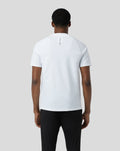 Back view of a model in a white BNS 1/4 Zip Top with neck label visible at the upper back.