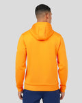 Back view of bright orange Mandarin Scuba Hoody 3.0 on a model.