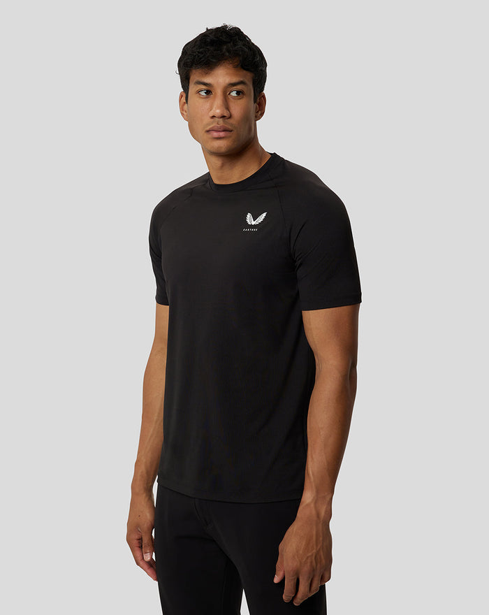 Male model in black Onyx short sleeve training T shirt with a small chest logo