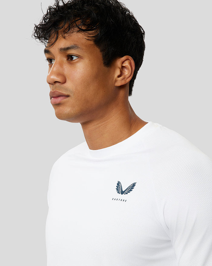 Close-up of the chest logo on a white Protek short sleeve training T shirt
