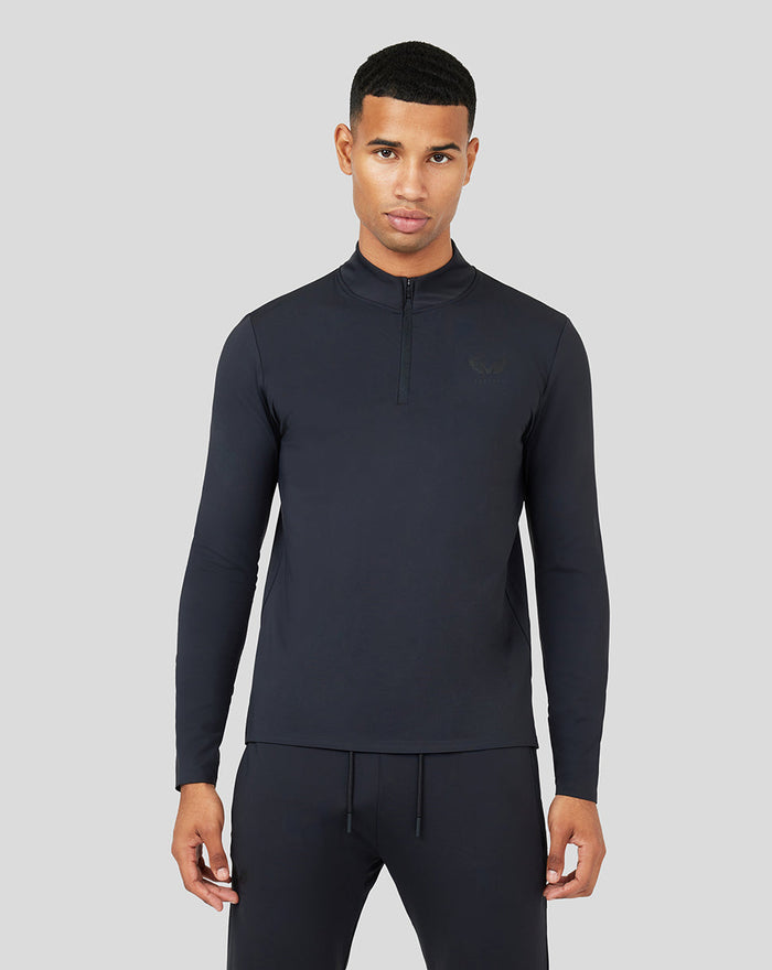 Dark Onyx Metatek 1/4 Zip top on a model, high stretch breathable fabric and slim tailored fit