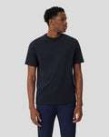 Man wearing navy Onyx Metropolis Recovery Tee with relaxed fit and minimal branding.