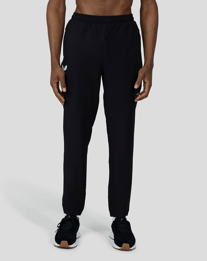 Model in black Hybrid Joggers with elastic cuffs and subtle Castore branding at back
