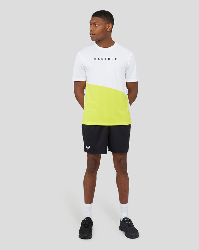 Male model wearing black 6 inch knitted shorts with a white Castore logo on the leg.