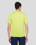 Back view of neon lime Core Tech T-Shirt with Castore branding running down the spine.