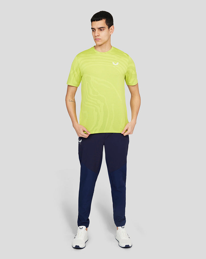 Front view of neon lime Core Tech T-Shirt with zebra pattern and small Castore logo on the chest.