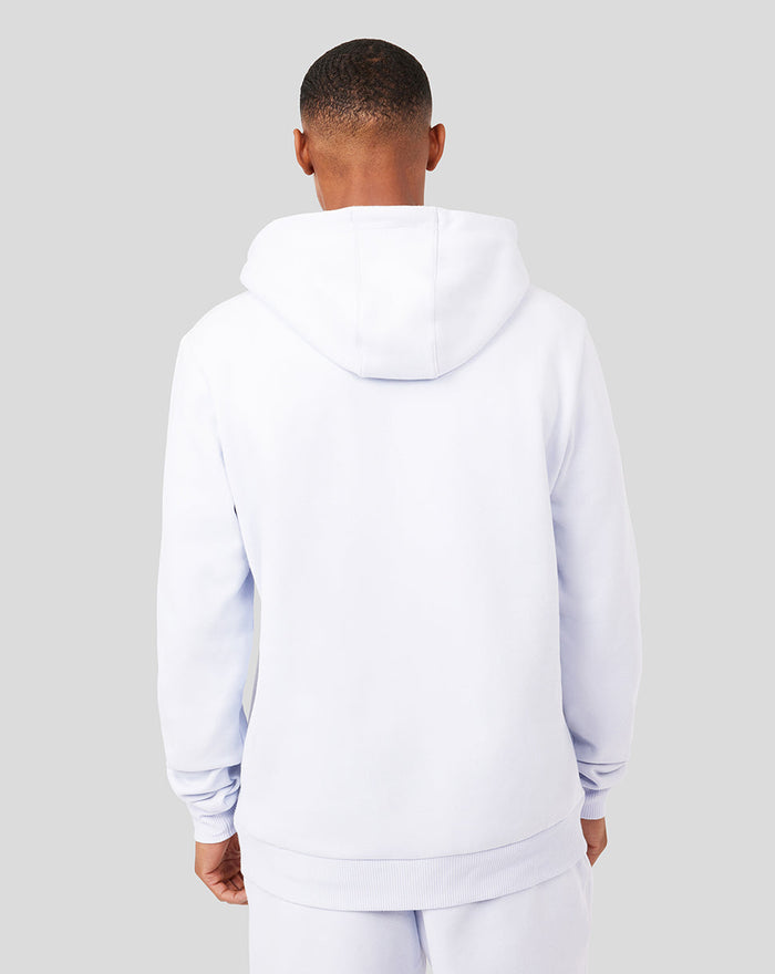 Back view of ice blue embroidered logo hoodie showing hood and relaxed fit on a model