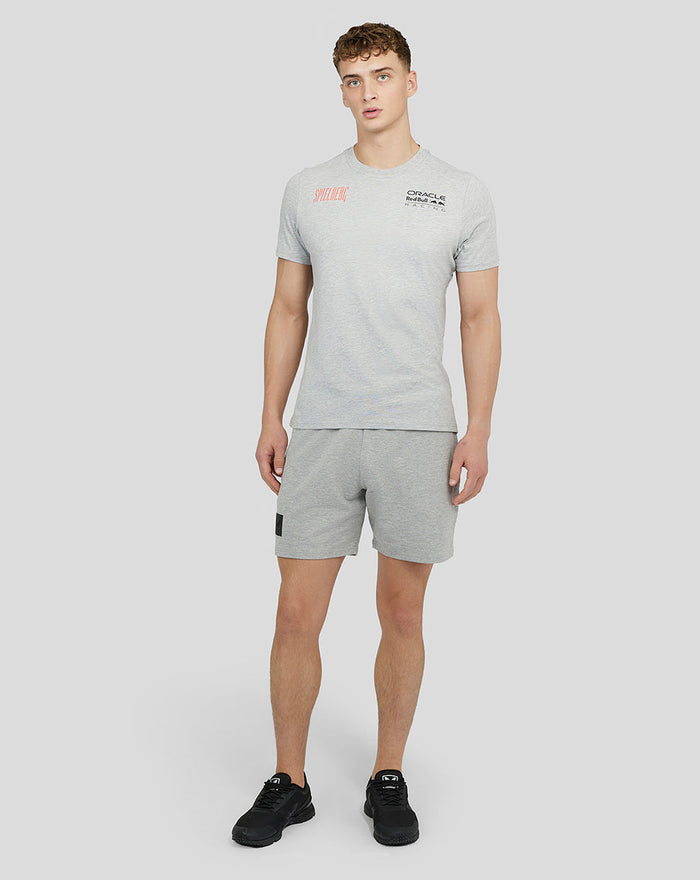 Male model wearing grey marl Red Bull Racing Spielberg short sleeve T shirt with Oracle logo on chest and matching shorts.